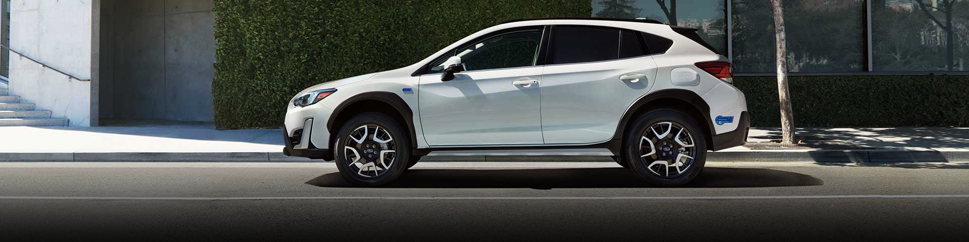 The side profile of a white Subaru Crosstrek Hybrid | Sunset Hills Subaru in Sunset Hills MO