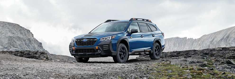 A 2023 Outback Wilderness parked in the mountains. | Sunset Hills Subaru in Sunset Hills MO